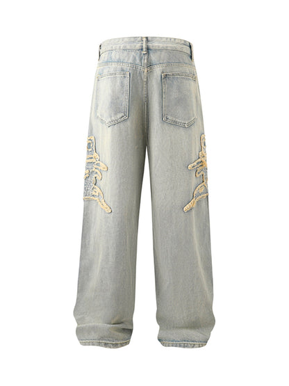 Thesupermade Gerade geschnittene Jeans mit Patches und Raw Edge