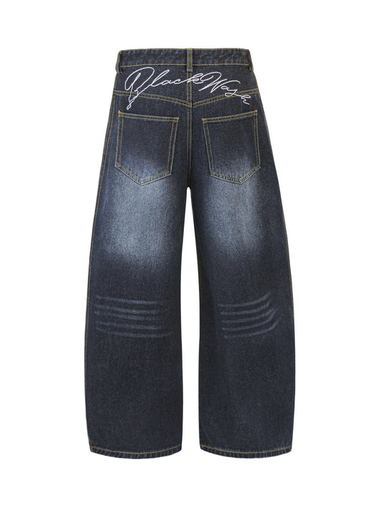 Zerrissene, verwaschene Barrel-Jeans mit Stickerei