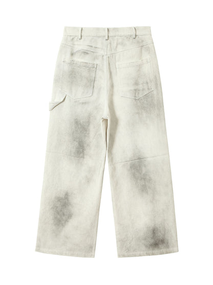 Pantalon de travail blanc délavé et teint par nouage