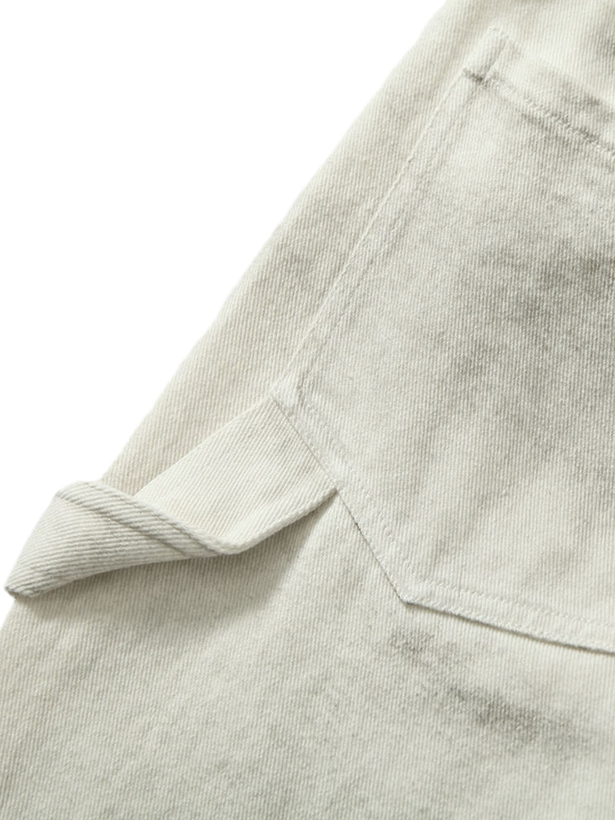 Pantalon de travail blanc délavé et teint par nouage