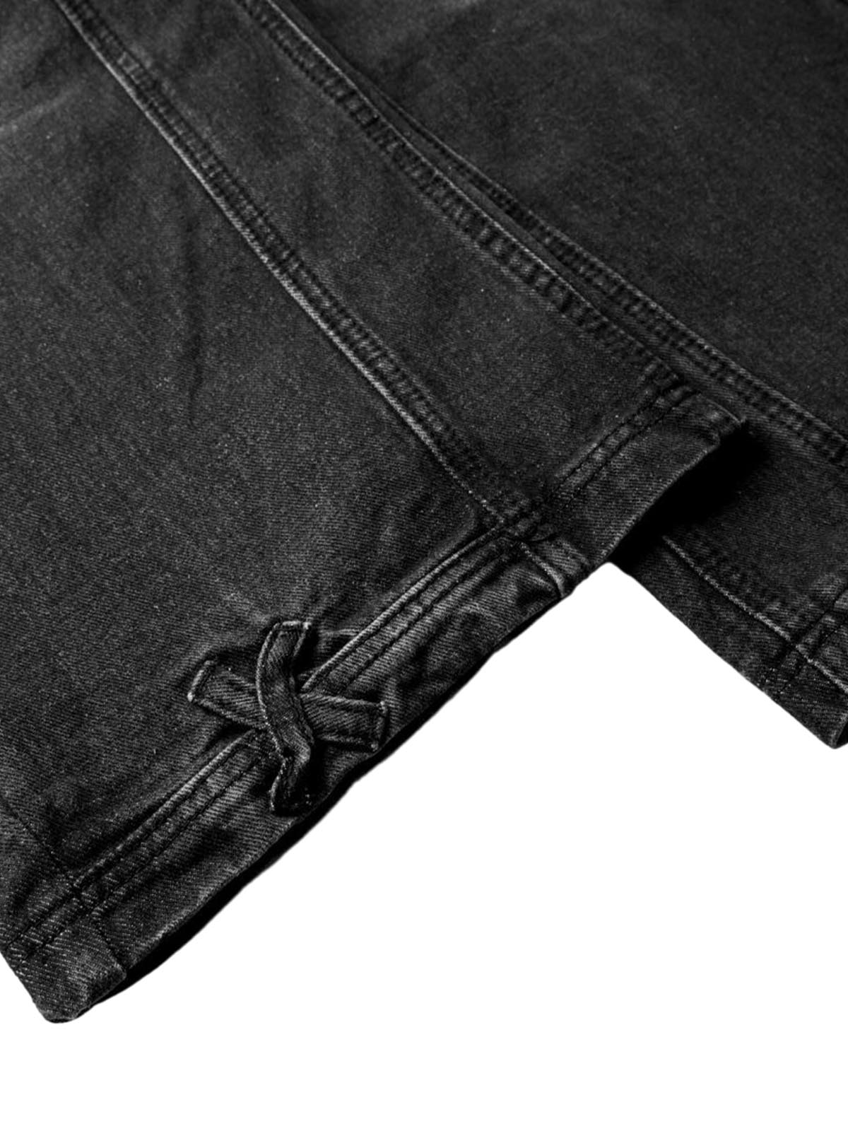 Verwaschene Distressed-Jeans im dekonstruierten Split-Cordstring-Stil