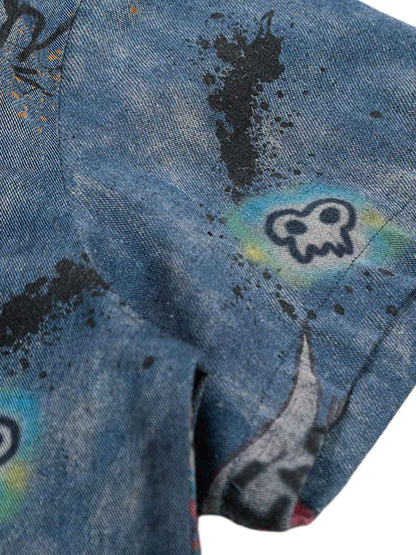 Poloshirt aus Denim mit Batik-Graffiti