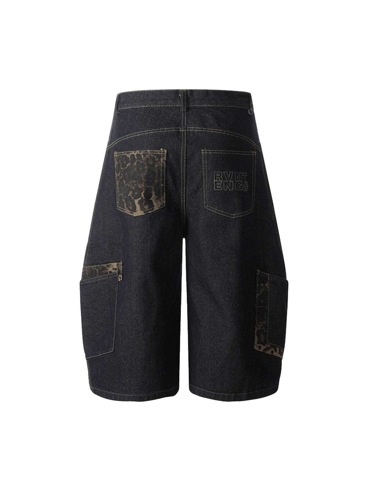 Jean patchwork en denim délavé à imprimé guépard