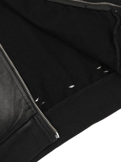 Sweat à capuche zippé déchiré et délavé