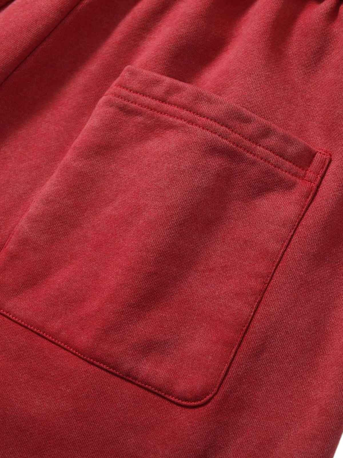 Zerrissene rote Culotte-Jeans im Used-Look