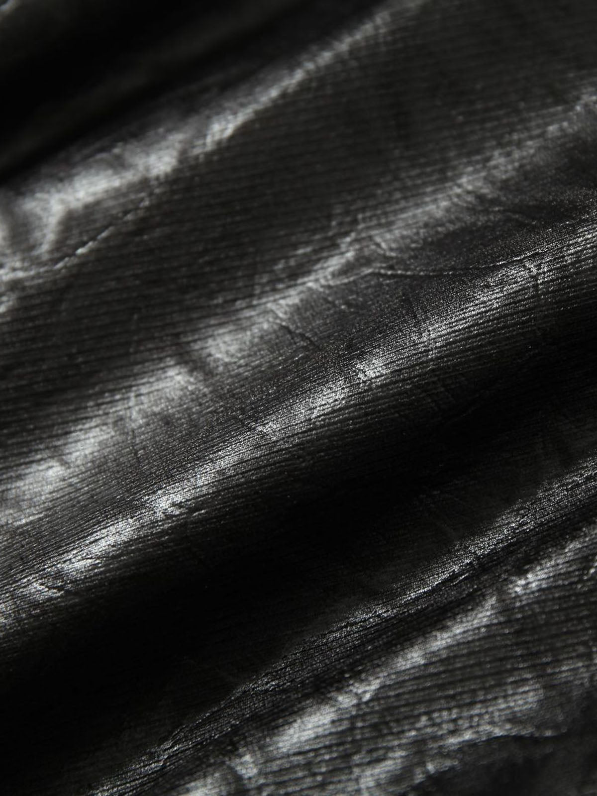 Lederjacke mit Spitzenbeschriftung und Fellkapuze