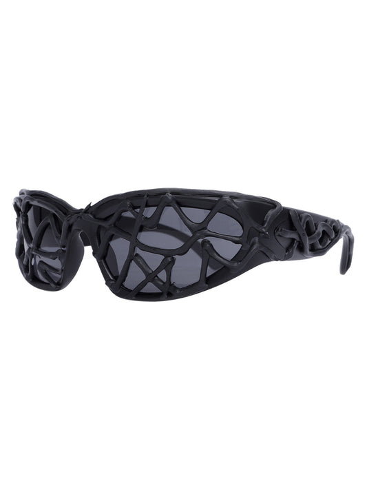Lunettes de soleil futuristes à monture ondulée