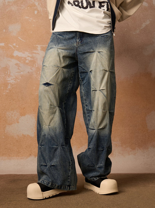 Jeans mit verwaschener Bundfaltenpartie