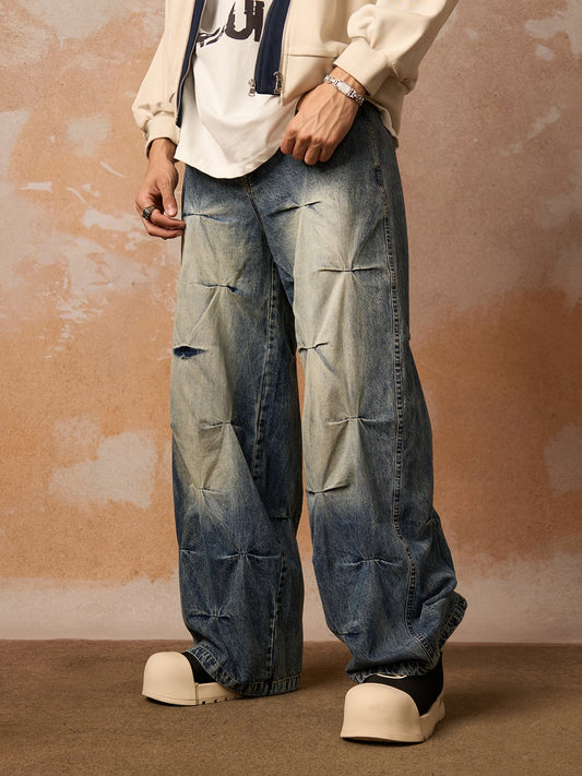 Jeans mit verwaschener Bundfaltenpartie