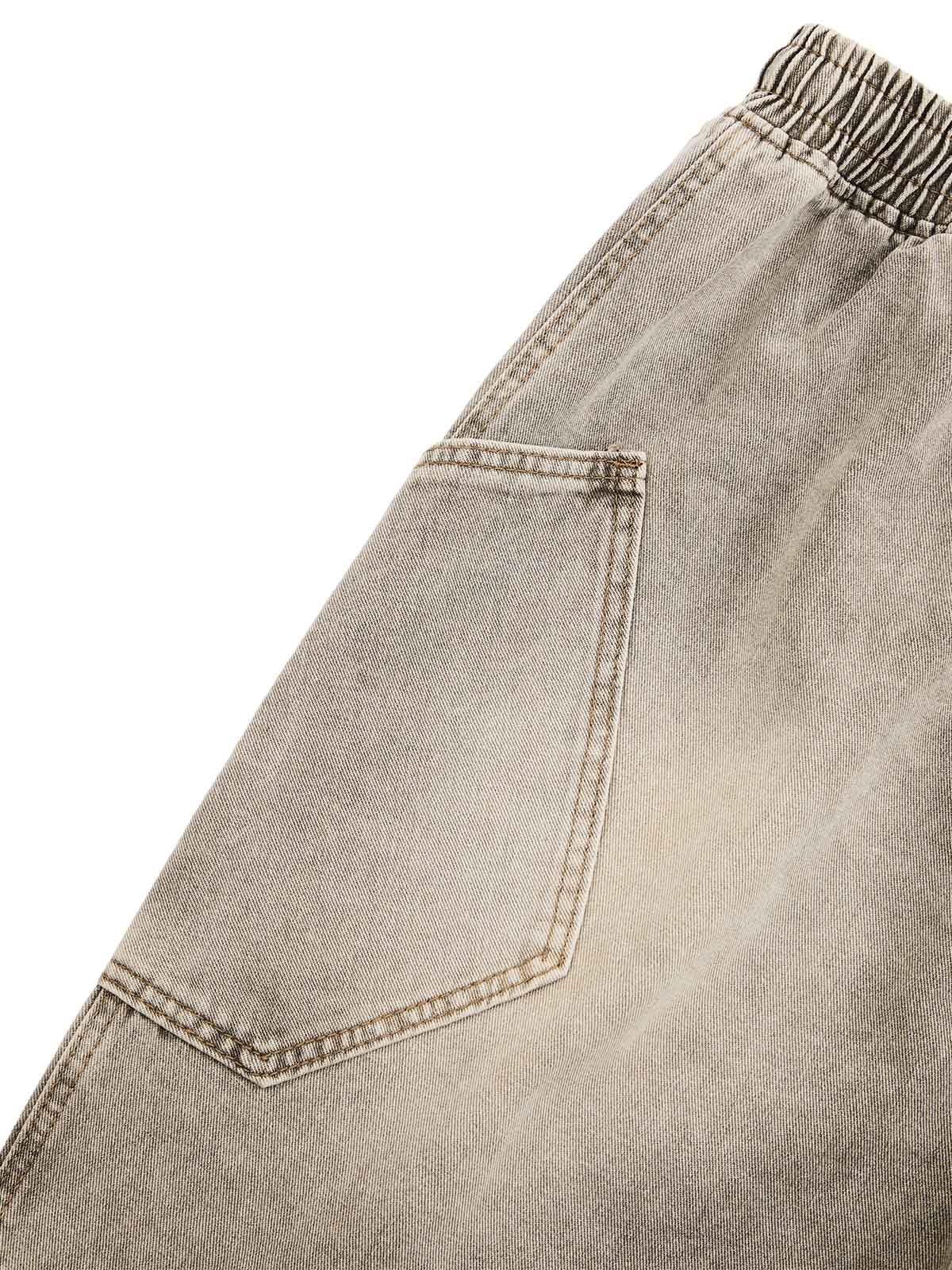 SHORT EN JEAN DÉCONSTRUITÉ À CORDON DE SERRAGE DÉLAVÉ VINTAGE