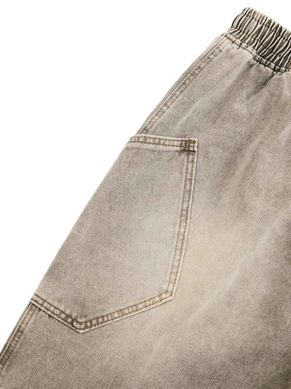 SHORT EN JEAN DÉCONSTRUITÉ À CORDON DE SERRAGE DÉLAVÉ VINTAGE