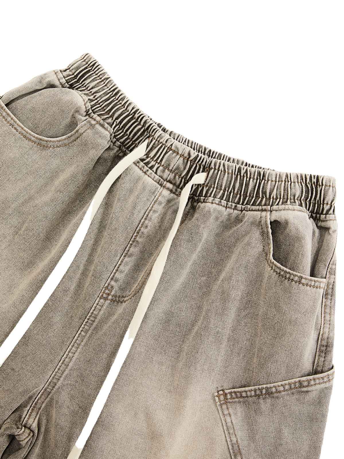 SHORT EN JEAN DÉCONSTRUITÉ À CORDON DE SERRAGE DÉLAVÉ VINTAGE