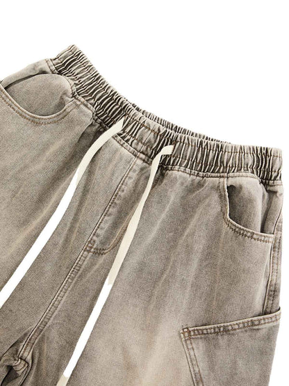 SHORT EN JEAN DÉCONSTRUITÉ À CORDON DE SERRAGE DÉLAVÉ VINTAGE