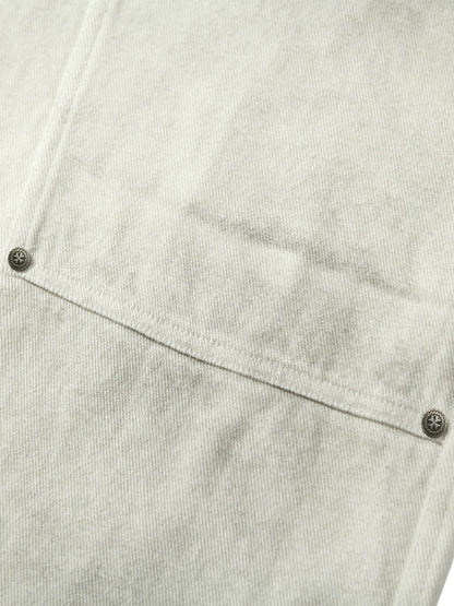Pantalon de travail blanc délavé et teint par nouage