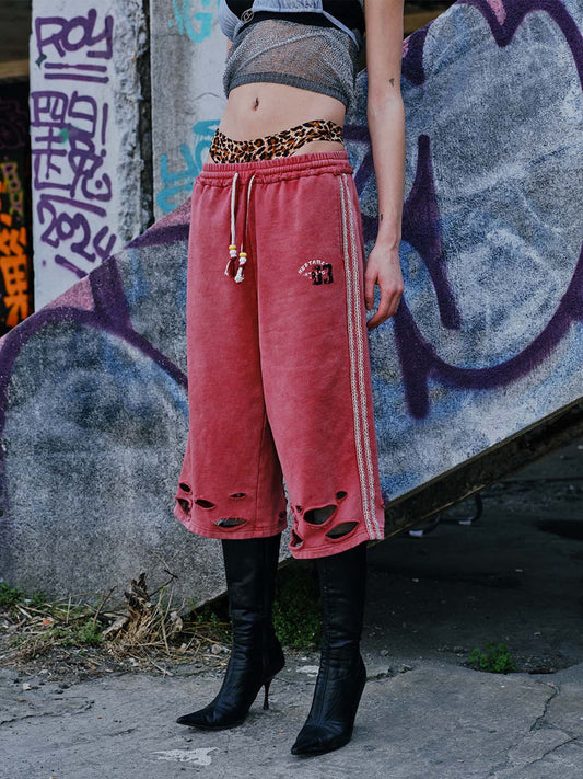 Zerrissene rote Culotte-Jeans im Used-Look