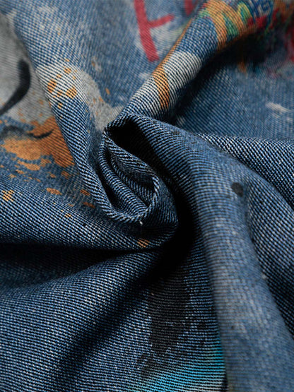 Poloshirt aus Denim mit Batik-Graffiti