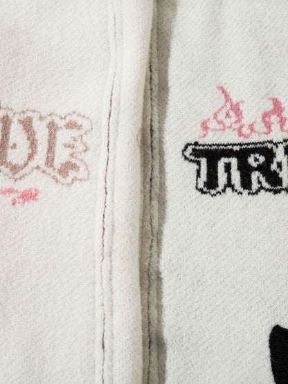 Pull zippé à col montant en jacquard de couleur contrastée Thesupermade
