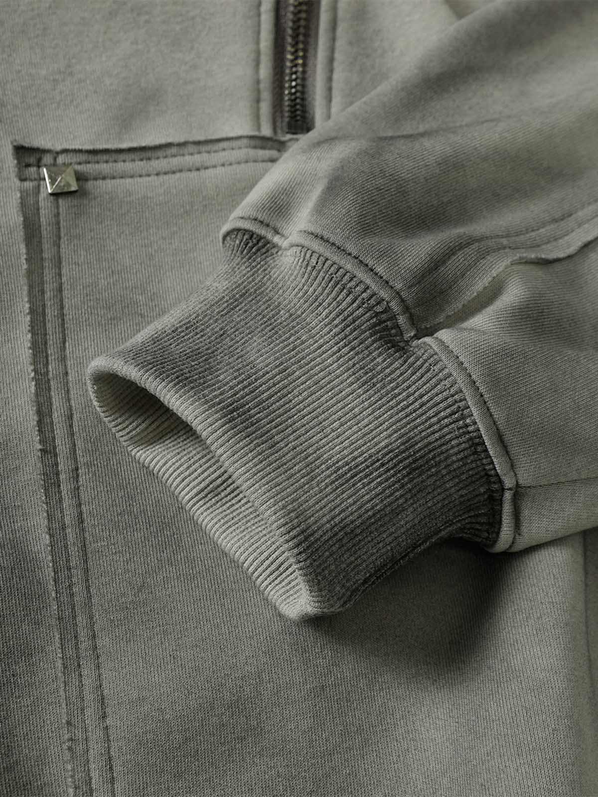 Veste à capuche délavée avec coutures vieillies et rivets