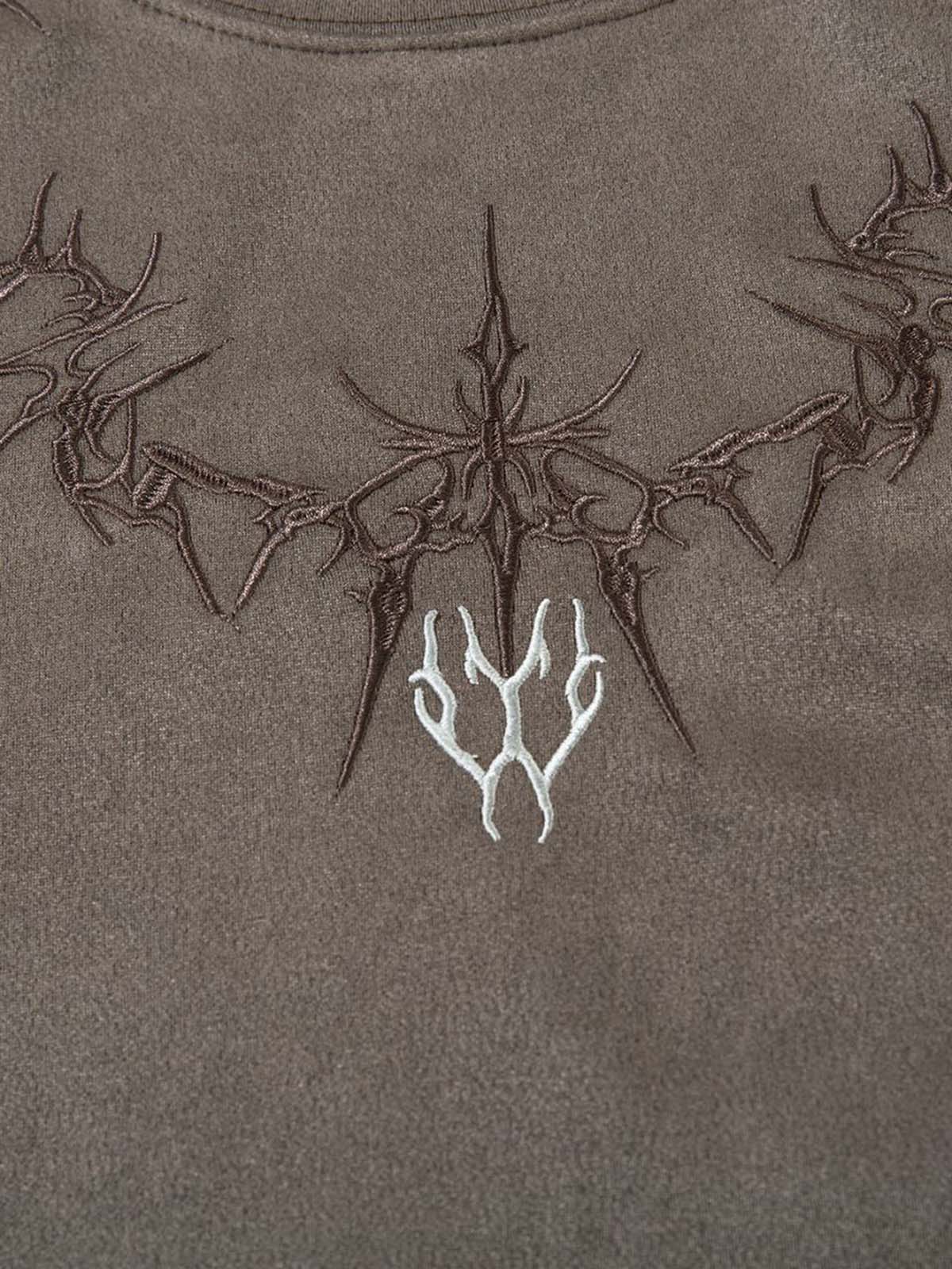 Gilet brodé d'épines en daim