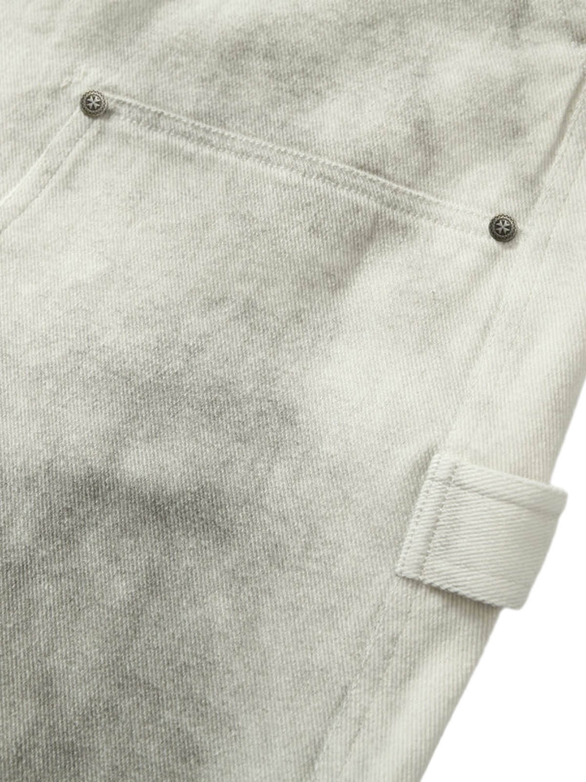 Pantalon de travail blanc délavé et teint par nouage
