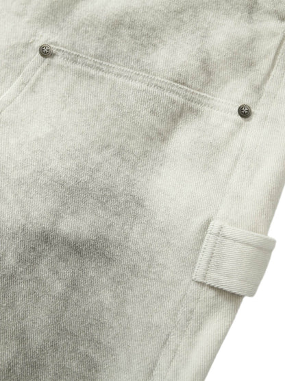 Pantalon de travail blanc délavé et teint par nouage