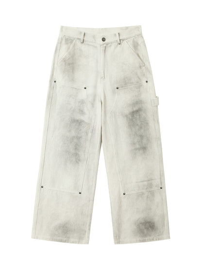 Pantalon de travail blanc délavé et teint par nouage