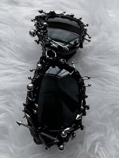 Lunettes de soleil style punk rivetées