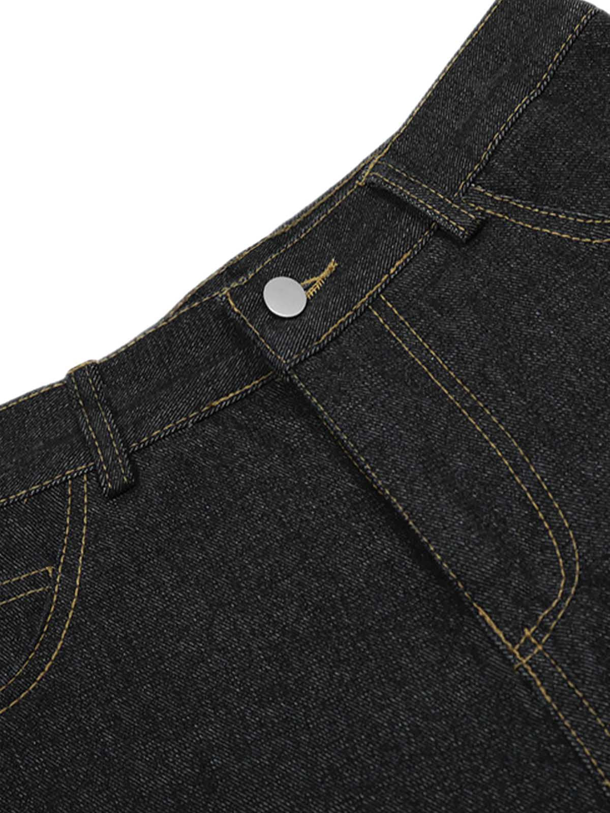 Jean patchwork en denim délavé à imprimé guépard