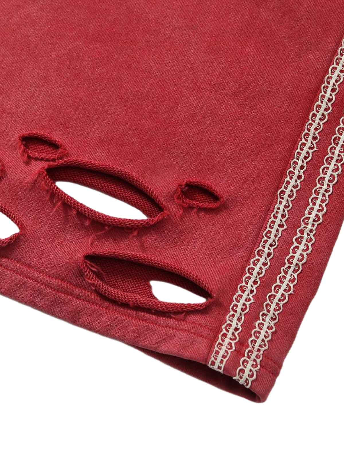 Zerrissene rote Culotte-Jeans im Used-Look