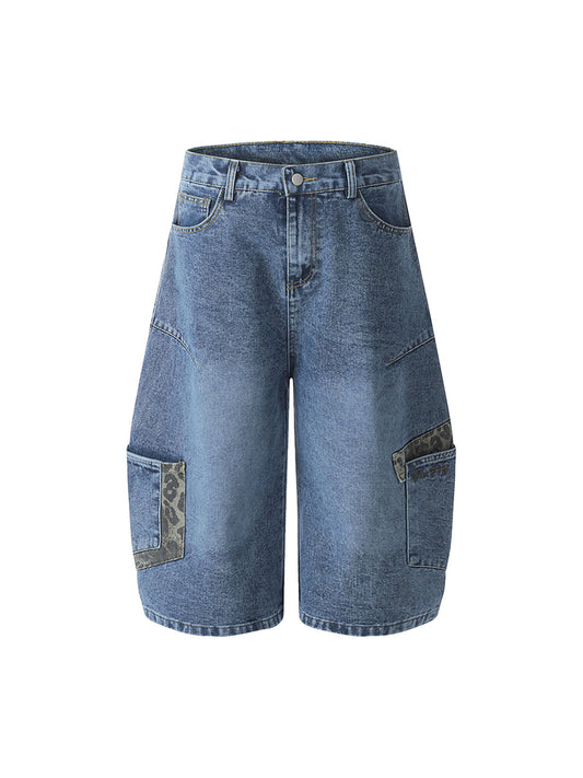 Jean patchwork en denim délavé à imprimé guépard