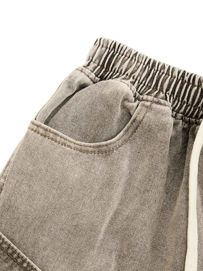 SHORT EN JEAN DÉCONSTRUITÉ À CORDON DE SERRAGE DÉLAVÉ VINTAGE