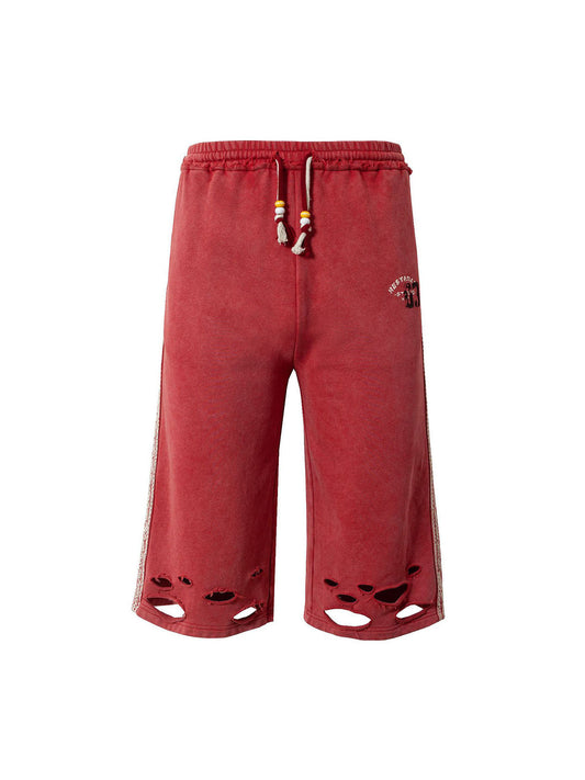 Zerrissene rote Culotte-Jeans im Used-Look