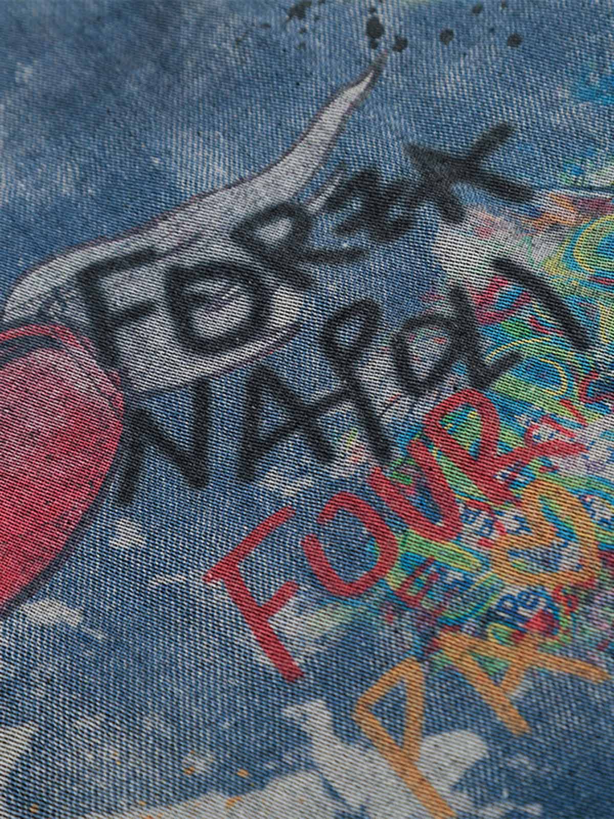 Poloshirt aus Denim mit Batik-Graffiti