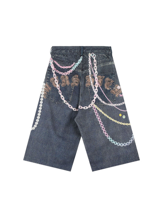 Short en jean à chaîne ornée