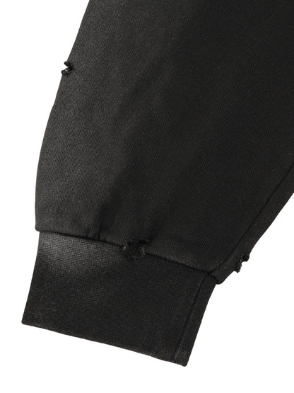 Sweat à capuche zippé déchiré et délavé