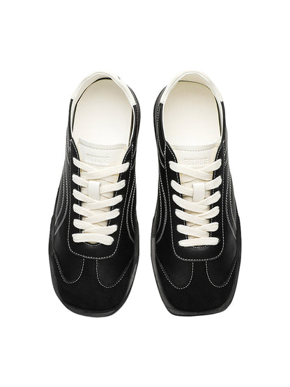 Classic Black Fluid Lines Leather Sneakers