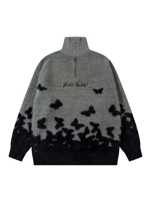 Pull col roulé zippé en faux vison et papillon Thesupermade