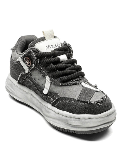 Sneakers mit Plateausohle und dekonstruiertem Split Whisker-Muster
